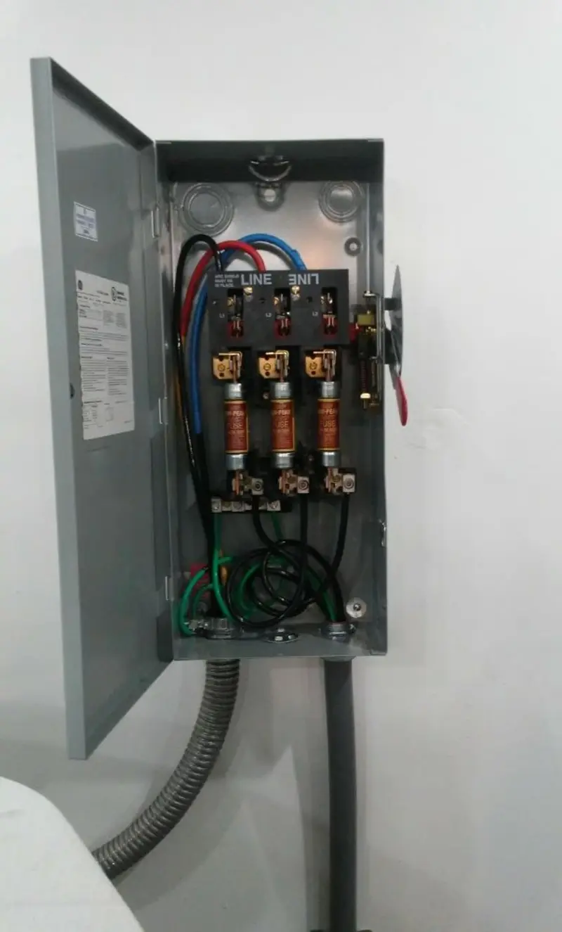 Three-phase disconnect switch installed for Smoke Detector Installation in Bend